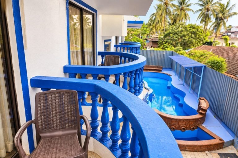 Room balcony with pool view at Omnia By The Sea
