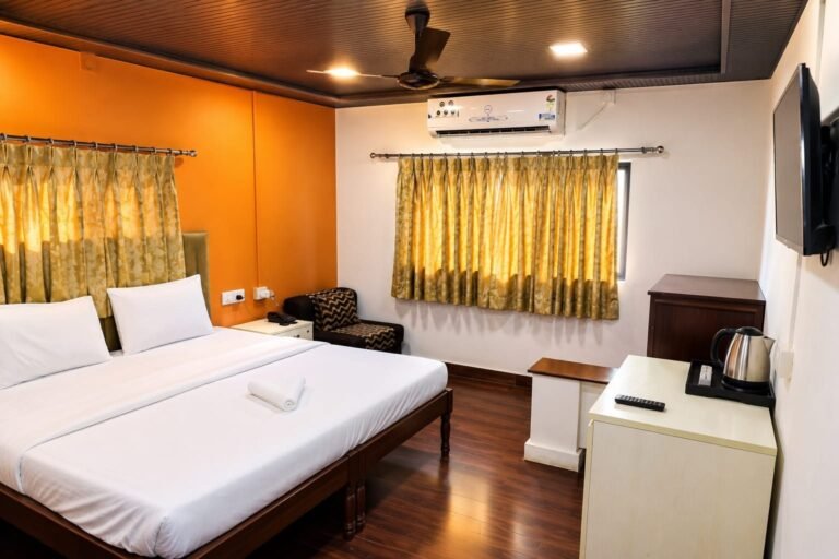 Deluxe room interior at Omnia By The Sea