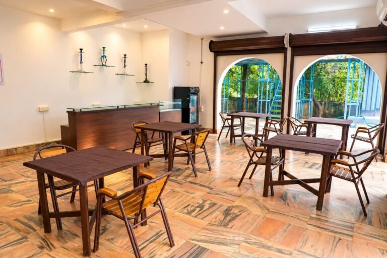 Restaurant and dining area at Omnia By The Sea Candolim