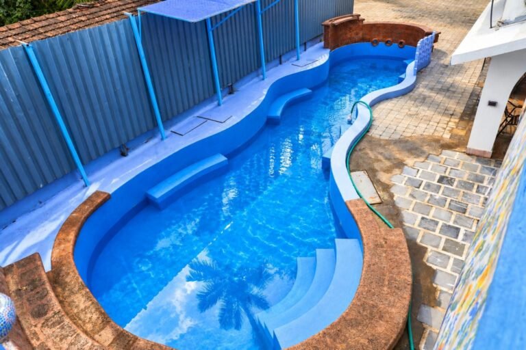 Outdoor swimming pool at Omnia By The Sea, North Goa